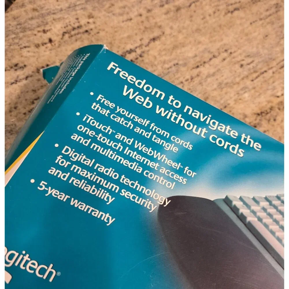 Logitech Cordless Freedom Navigator Keyboard Wheel Mouse Receiver User Guide